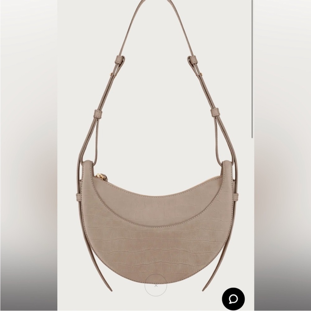Polène Paris Numéro Dix
EDITION CROCODILE
NUBUCK TAUPE - Picture 2 of 7